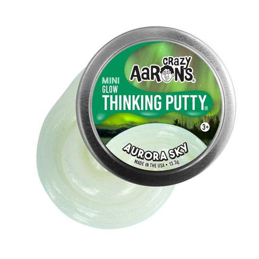 Mini Glow Aurora Sky Thinking Putty in shimmering light green that glows softly, soft and stretchy putty for ages 3+