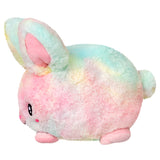 Tie Dye Bunny Snackers plush with soft pastel tie dye fur, round shape, and cute smiling face, perfect for all ages.