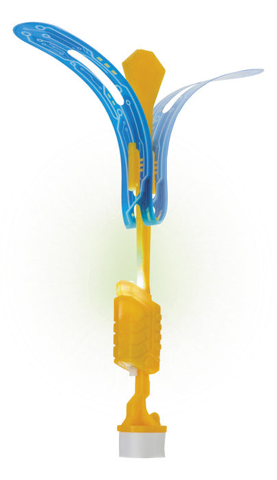 Dragonfly Copter toy with blue and yellow wings that light up, designed to launch and twirl high into the sky.
