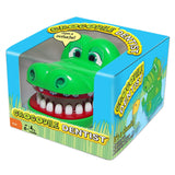 Crocodile Dentist game in colorful box featuring a green crocodile with interactive teeth for kids aged 4 and up.