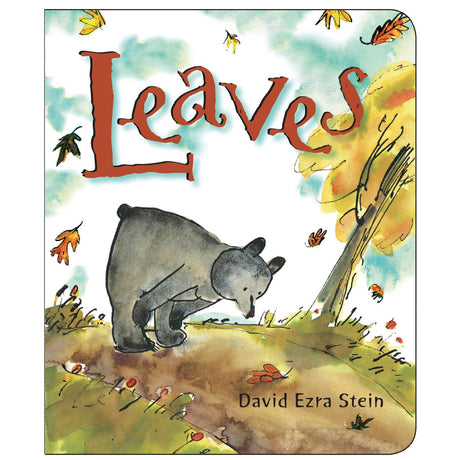 Leaves board book cover with a young bear exploring colorful autumn leaves on a tree-lined path.