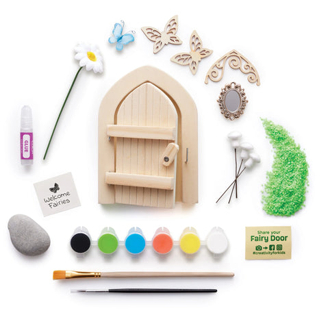 Butterfly Fairy Door craft kit with wooden door, paint set, brushes, decorations, and instructions for outdoor fairy fun.